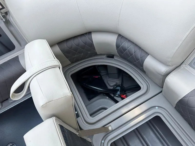 Slide: The Image of 2024 Sun Tracker Party Barge 20 DLX interior storage compartment. - 33