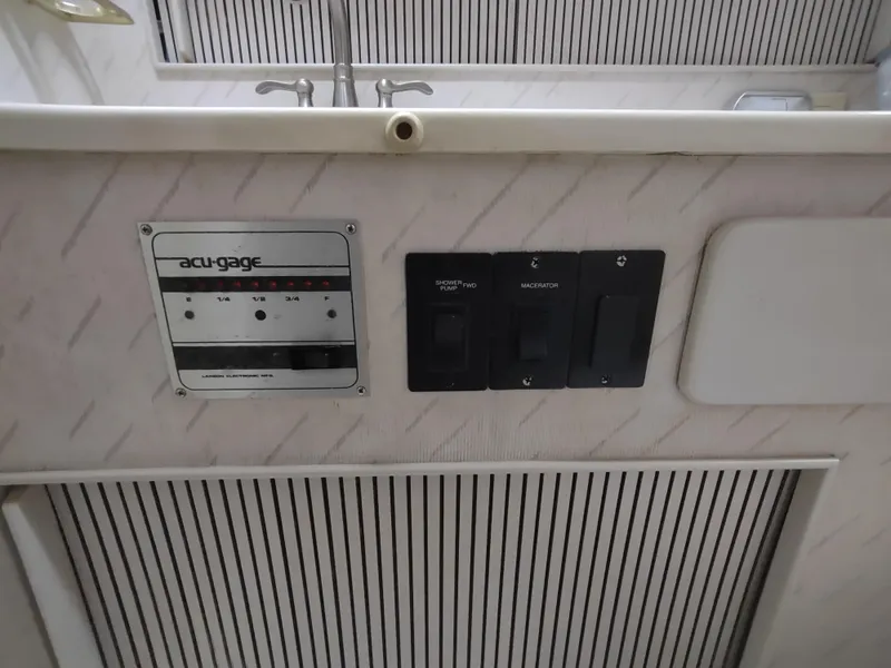 Slide: The Image of Control panel on 1988 Tollycraft 34 Sport Sedan boat. - 21