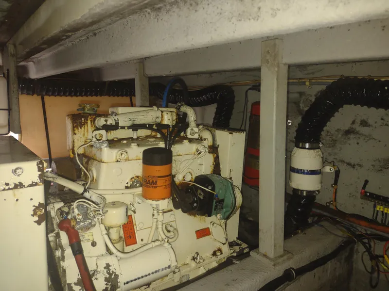 Slide: The Image of Engine room of a 1988 Tollycraft 34 Sport Sedan boat. - 44