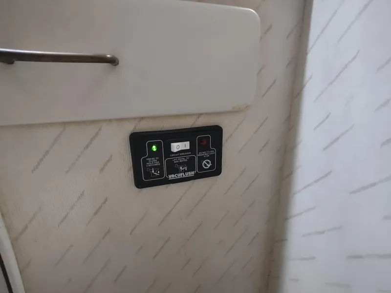 Slide: The Image of Control panel on a 1988 Tollycraft 34 Sport Sedan boat. - 22