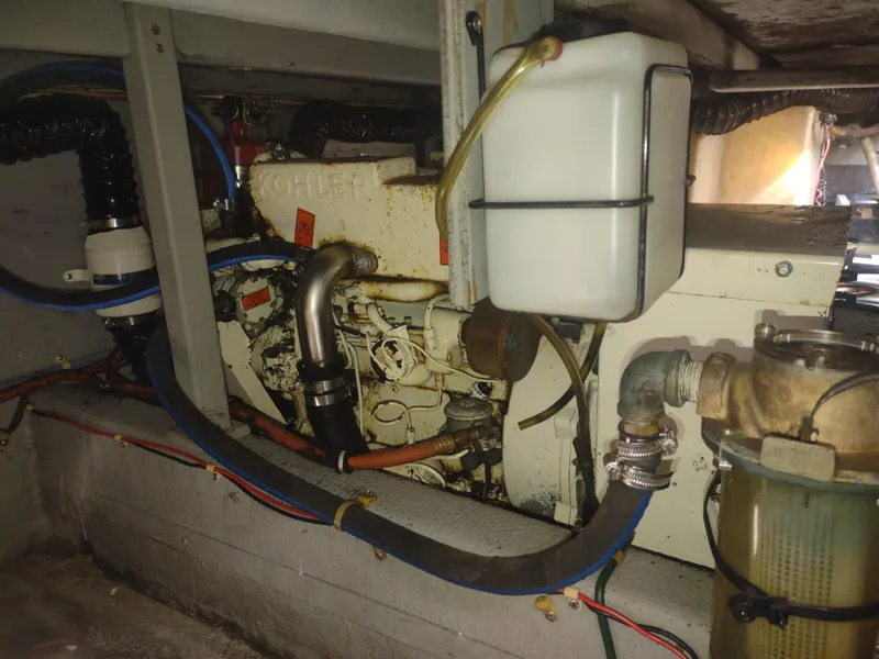Slide: The Image of Engine compartment of a 1988 Tollycraft 34 Sport Sedan boat. - 45