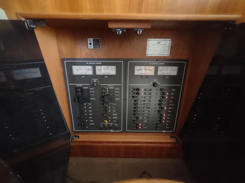 Slide: The Image of Electrical control panel of a 1988 Tollycraft 34 Sport Sedan boat. - 23