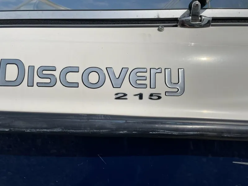 Slide: The Image of 2007 Bayliner Discovery 215 boat model nameplate. - 19