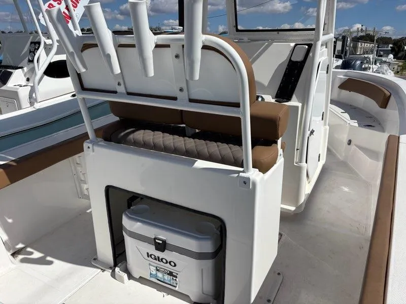 Slide: The Image of 2024 Polar 220 boat interior with seating and Igloo cooler. - 3