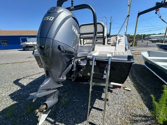 Slide: The Image of 2025 Starcraft SVX 191 OB CC boat with Yamaha 150 outboard motor. - 2