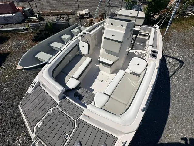 Slide: The Image of 2025 Starcraft SVX 191 OB CC boat with spacious seating and modern design. - 3