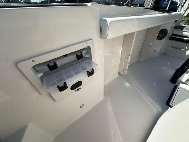 Slide: The Image of 2025 Starcraft SVX 191 OB CC boat interior storage compartment. - 7