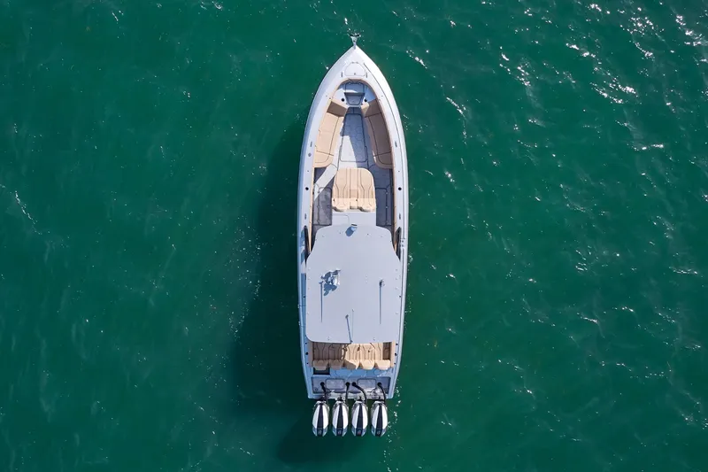 Slide: The Image of 2024 Midnight Express 37' Open boat on the water, aerial view. - 11