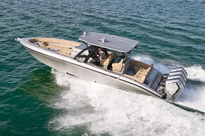 Slide: The Image of 2024 Midnight Express 37' Open boat cruising on the water. - 3