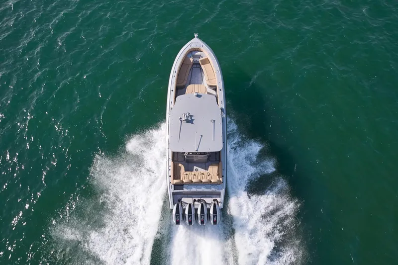 Slide: The Image of 2024 Midnight Express 37' Open boat cruising on the water. - 5