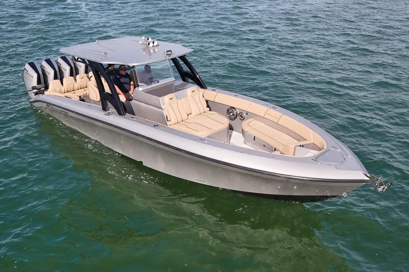 Slide: The Image of 2024 Midnight Express 37' Open boat cruising on water. - 6