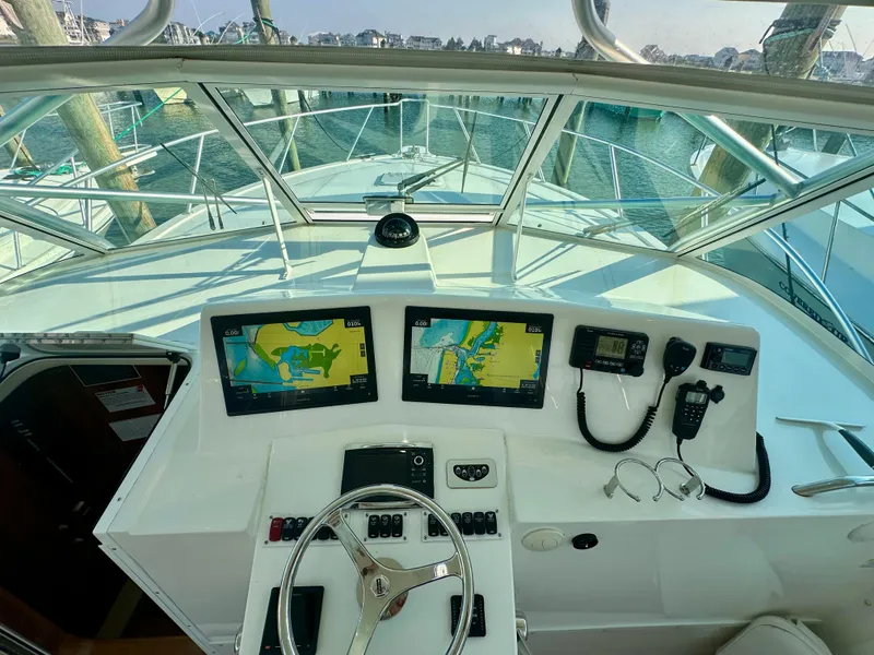Slide: The Image of Helm of 2014 Albemarle 360 Express Fisherman with navigation screens and controls. - 14