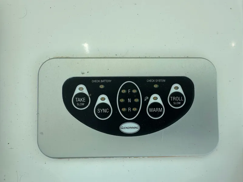 Slide: The Image of Control panel of a 2014 Albemarle 360 Express Fisherman boat with various function buttons. - 17