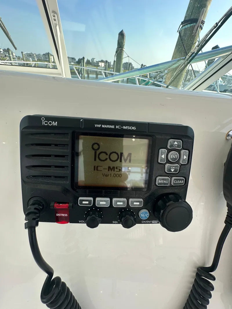 Slide: The Image of VHF marine radio on 2014 Albemarle 360 Express Fisherman boat dashboard. - 18