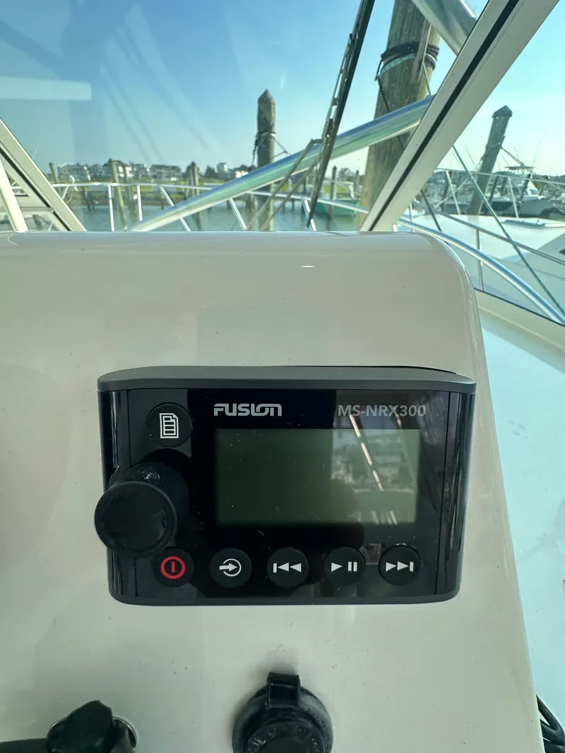 Slide: The Image of Fusion MS-NRX300 marine stereo on 2014 Albemarle 360 Express Fisherman boat dashboard. - 20