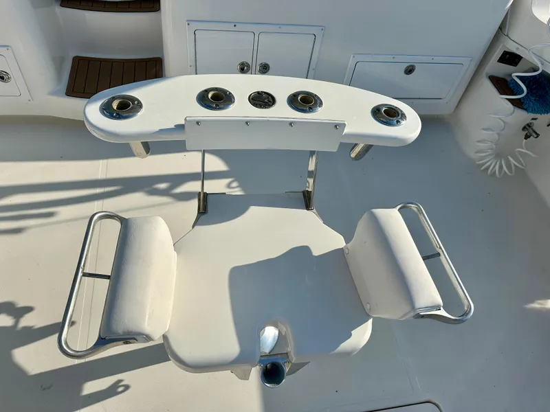 Slide: The Image of Fishing chair and rod holders on 2014 Albemarle 360 Express Fisherman boat deck. - 3