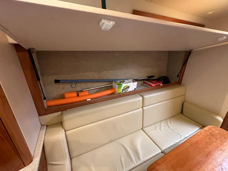 Slide: The Image of 2014 Albemarle 360 Express Fisherman interior storage with seating and supplies. - 31