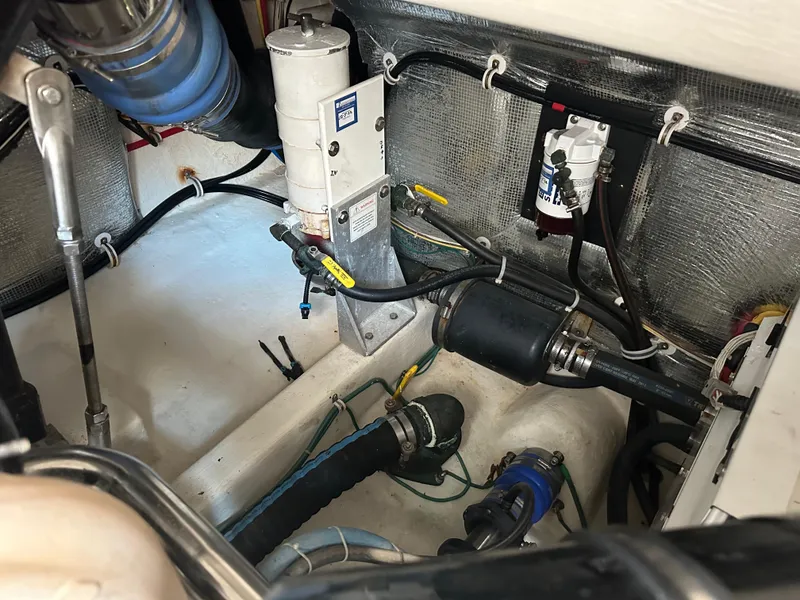 Slide: The Image of Engine compartment of 2014 Albemarle 360 Express Fisherman, showcasing mechanical components and wiring. - 40