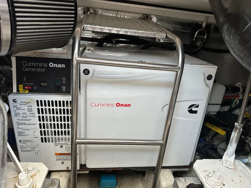 Slide: The Image of Cummins Onan generator in 2014 Albemarle 360 Express Fisherman boat engine room. - 42