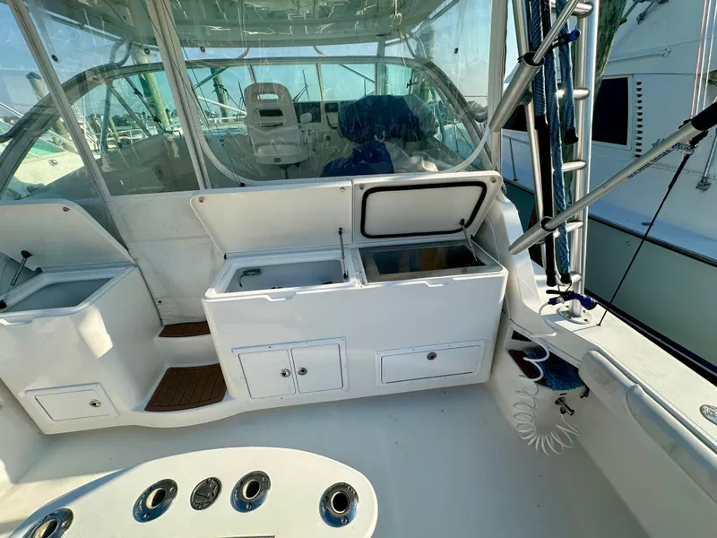 Slide: The Image of 2014 Albemarle 360 Express Fisherman boat interior with open storage compartments. - 5