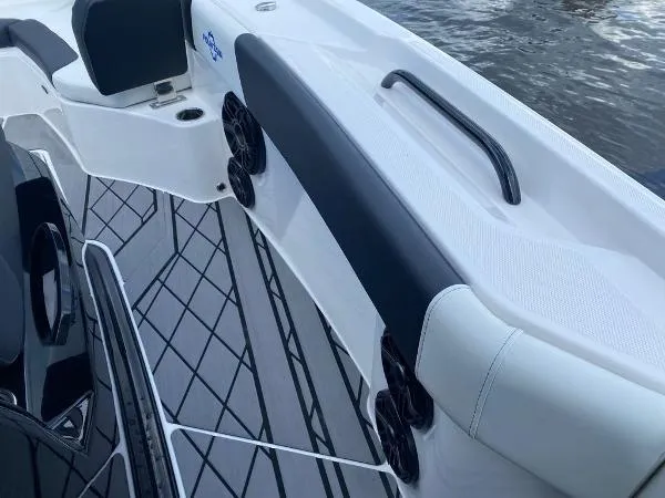 Slide: The Image of 2025 Fountain 32 NX boat interior bathroom with toilet and sink. - 18