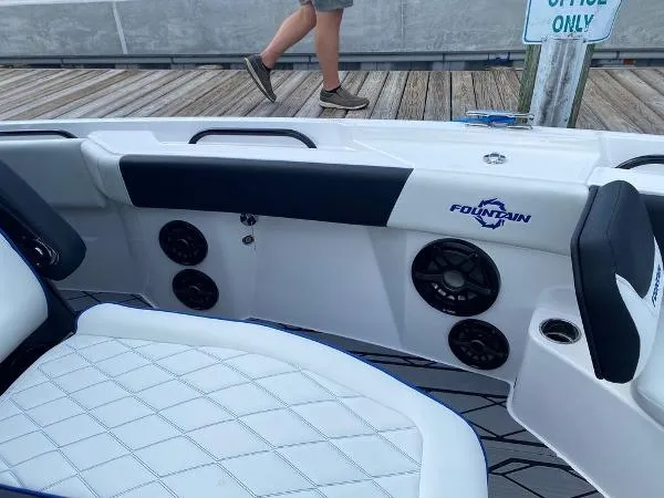 Slide: The Image of Control panel of a 2025 Fountain 32 NX boat with switches and gauges. - 19