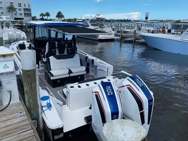 Slide: The Image of 2025 Fountain 32 NX boat in marina storage facility. - 23