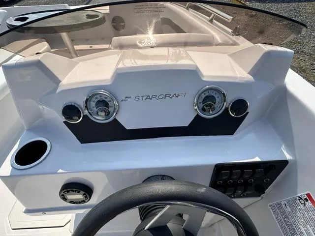 Slide: The Image of Dashboard of 2025 Starcraft SVX 171 OB boat with gauges and controls. - 5
