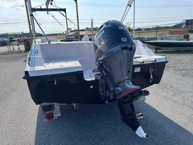 Slide: The Image of 2025 Starcraft SVX 171 OB boat with Yamaha outboard motor, rear view. - 8