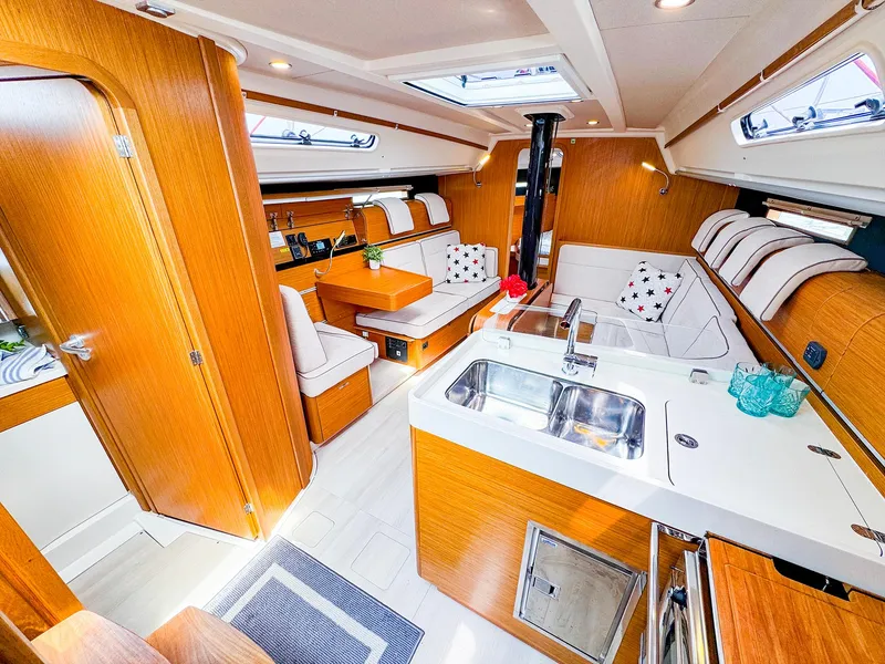 Slide: The Image of Modern interior of 2021 Dehler 42c sailboat with cozy seating and kitchenette. - 16