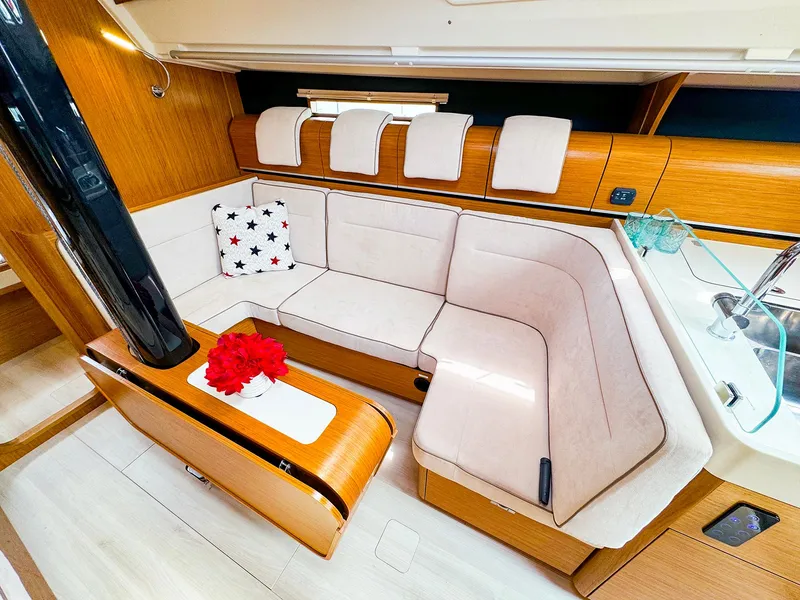 Slide: The Image of Interior of 2021 Dehler 42c sailboat with cozy seating and modern design. - 18