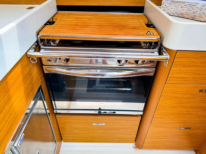 Slide: The Image of Modern kitchen area in 2021 Dehler 42c yacht with stainless steel oven. - 30