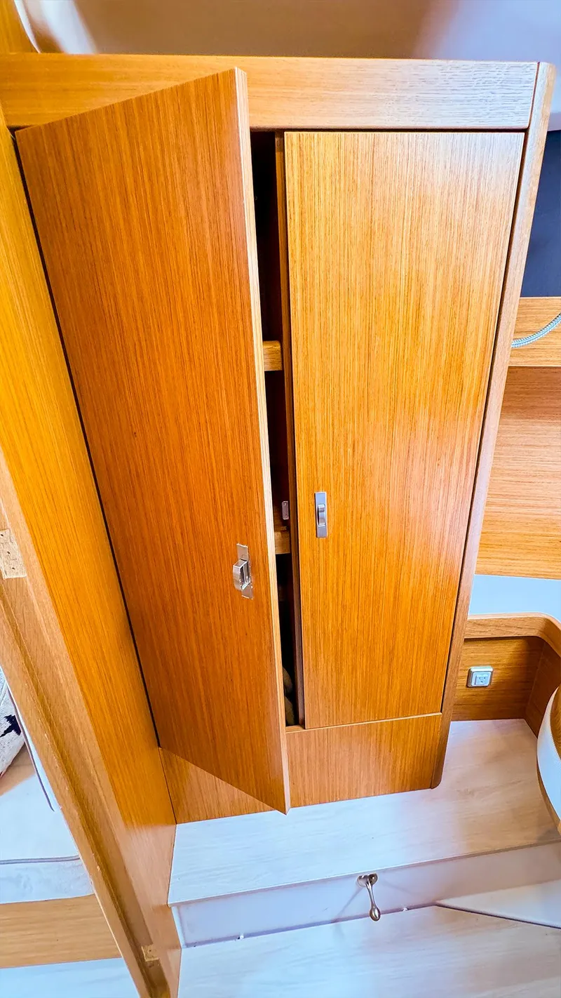 Slide: The Image of Wooden cabinet in the interior of a 2021 Dehler 42c sailboat. - 33