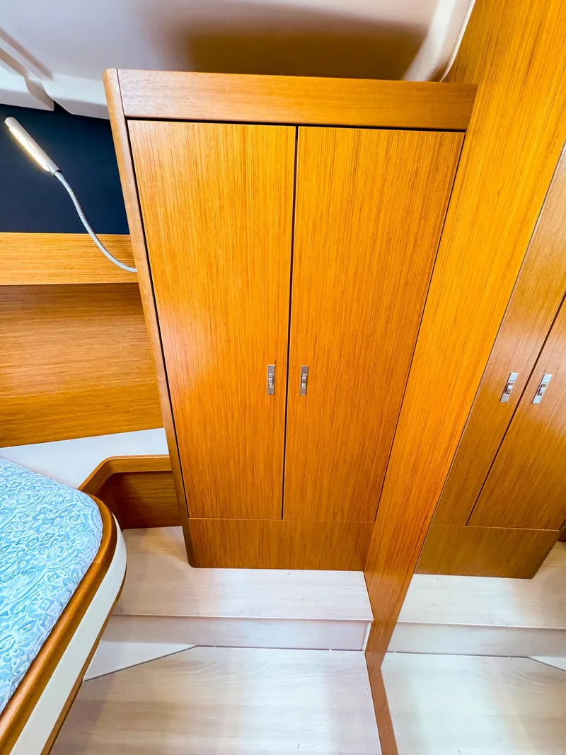 Slide: The Image of Wooden wardrobe in the cabin of a 2021 Dehler 42c sailboat. - 34