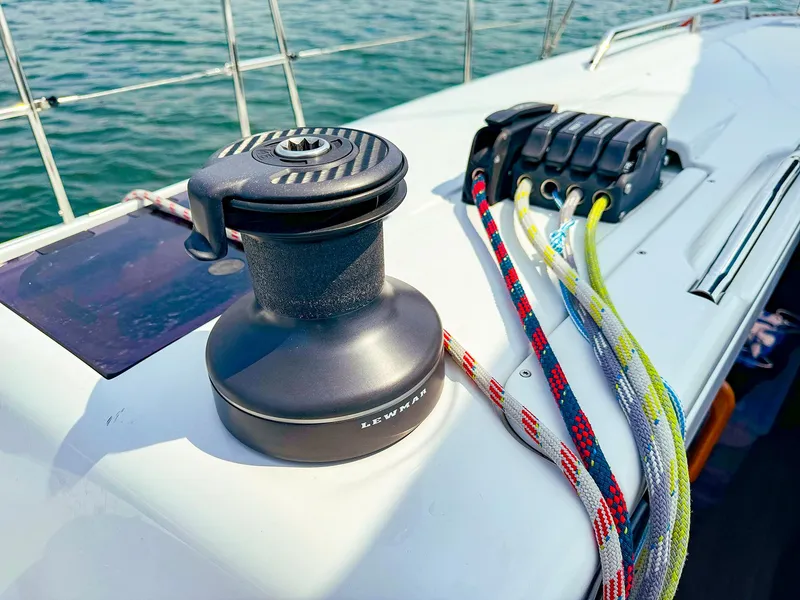 Slide: The Image of Winch and colorful ropes on a 2021 Dehler 42c sailboat deck. - 7