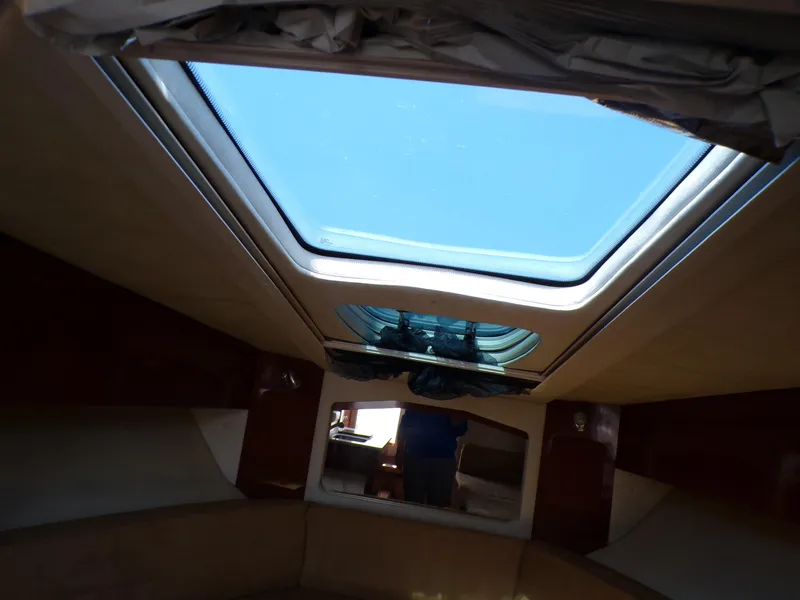 Slide: The Image of Interior cabin of 2010 Sea Ray Sundancer with skylight. - 19