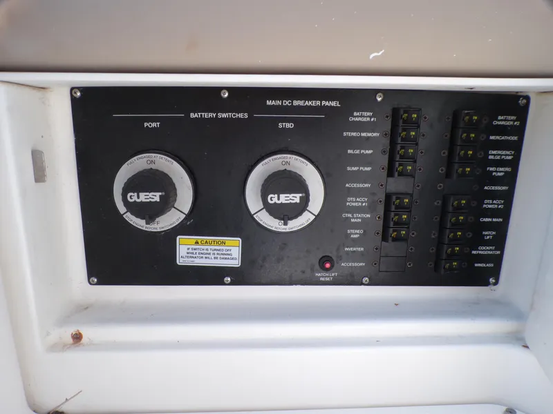 Slide: The Image of Sea Ray Sundancer 2010 main DC breaker panel with battery switches and circuit breakers. - 20