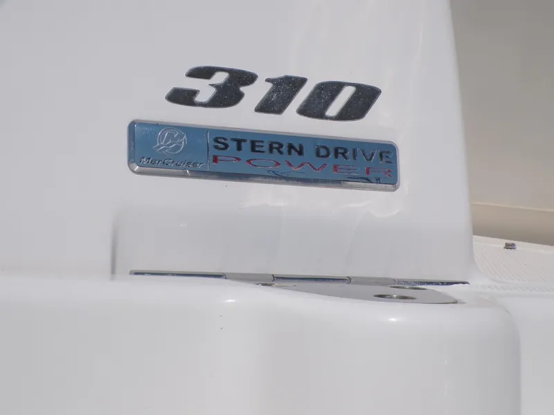 Slide: The Image of 2010 Sea Ray Sundancer 310 Stern Drive Power emblem. - 4