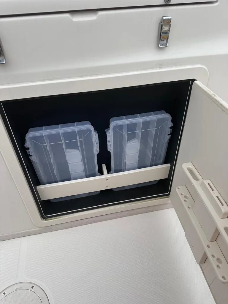 Slide: The Image of Storage compartment on a 2022 Grady-White Canyon 326 boat. - 17