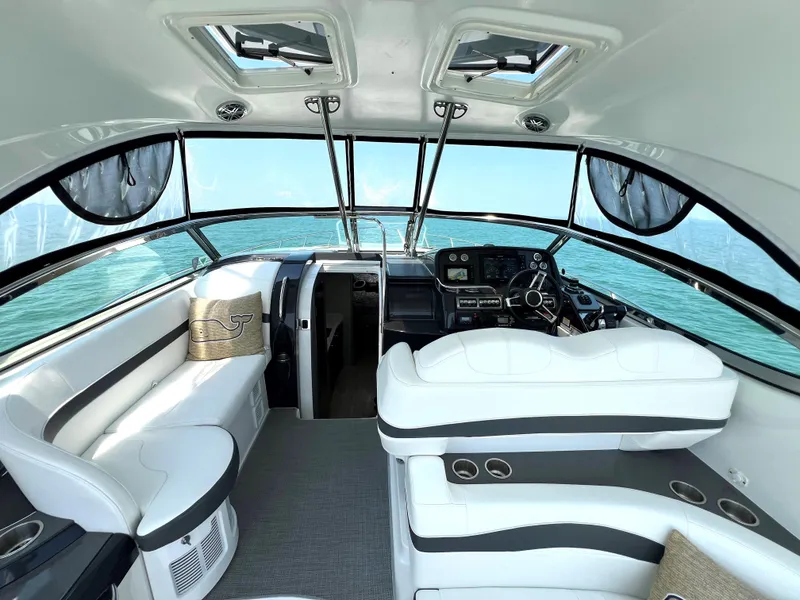 Slide: The Image of Interior of a 2017 Formula 37 Performance Cruiser with luxurious seating and modern dashboard. - 12