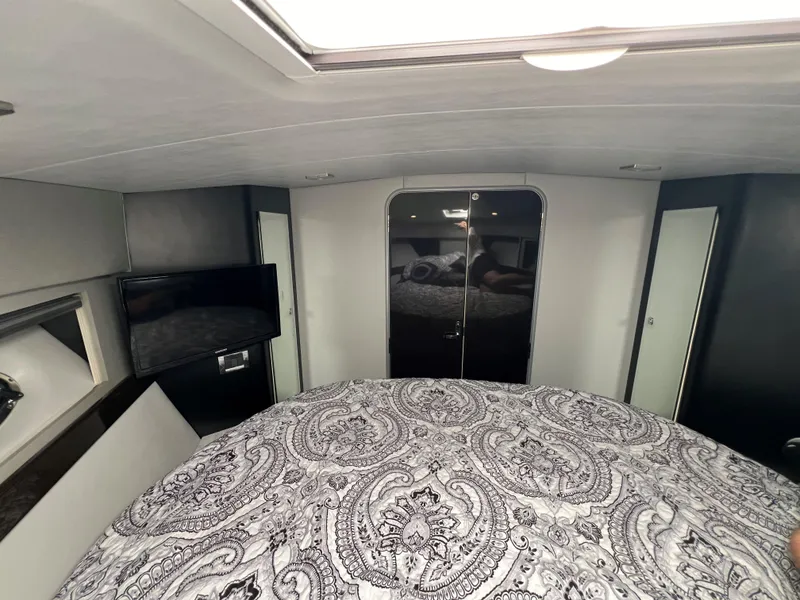 Slide: The Image of Interior cabin of 2017 Formula 37 Performance Cruiser with bed and TV. - 27