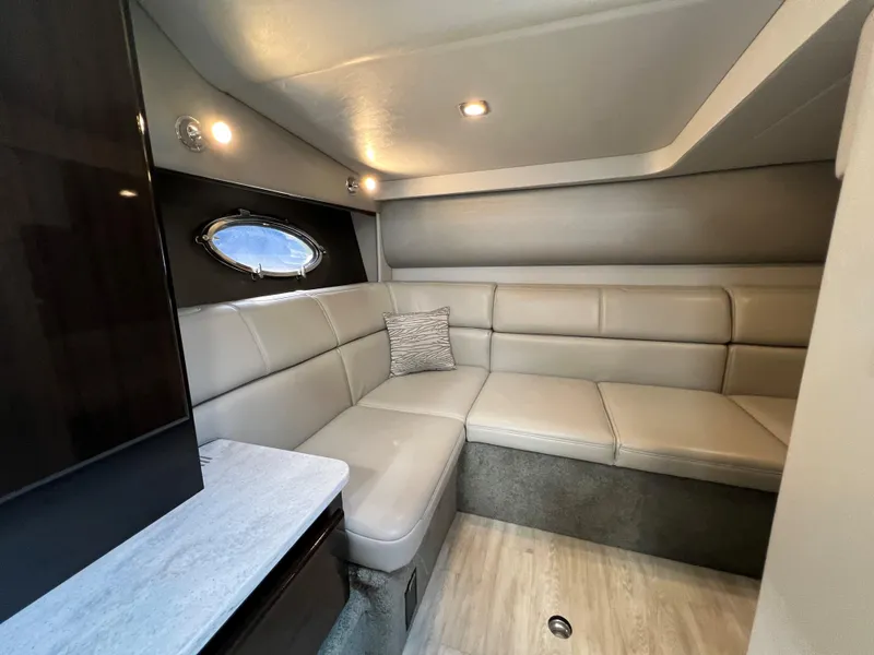 Slide: The Image of 2017 Formula 37 Performance Cruiser interior with beige leather seating and modern lighting. - 32