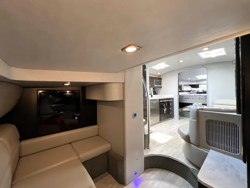 Slide: The Image of Interior of a 2017 Formula 37 Performance Cruiser with modern seating and a cozy cabin. - 33