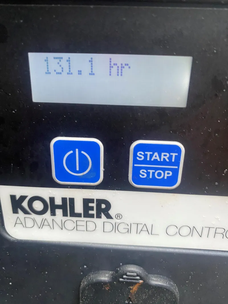 Slide: The Image of Kohler Advanced Digital Control panel showing 131.1 hours on a 2017 Formula 37 Performance Cruiser. - 37