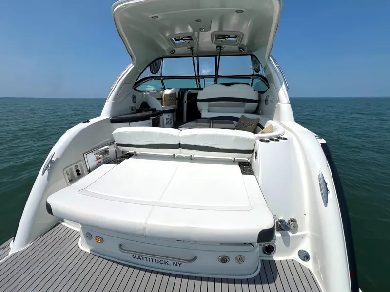 Slide: The Image of 2017 Formula 37 Performance Cruiser boat with spacious deck and seating, docked in Mattituck, NY. - 4