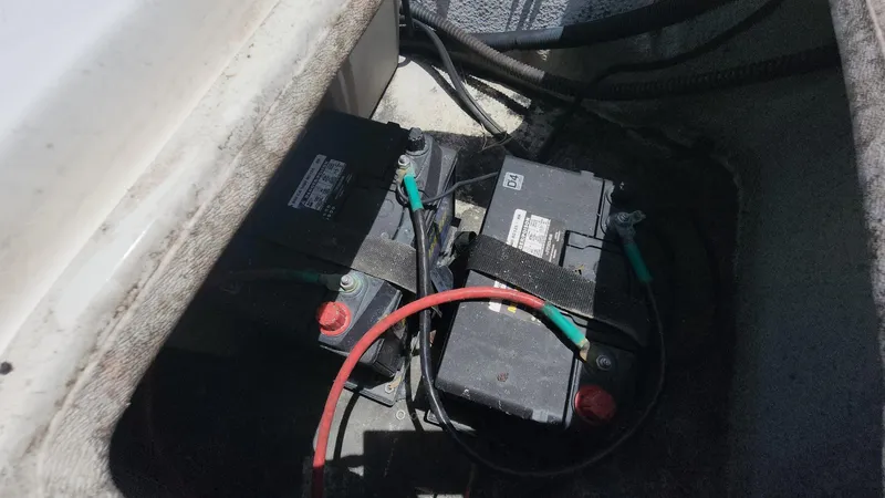 Slide: The Image of Batteries in a 2011 Carolina Skiff 178 DLV boat compartment. - 11