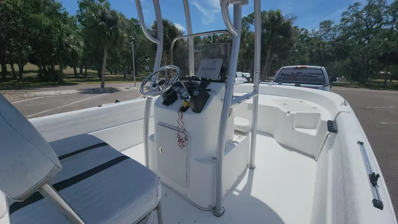 Slide: The Image of 2011 Carolina Skiff 178 DLV boat interior with steering console and seating. - 28