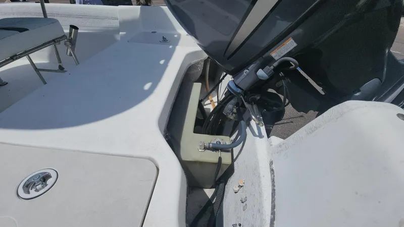 Slide: The Image of 2011 Carolina Skiff 178 DLV boat engine and deck view. - 30