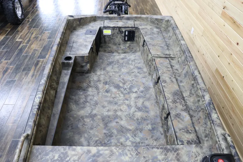 Slide: The Image of 2025 Excel 1751 Viper F4 boat interior with camouflage design and spacious layout. - 10