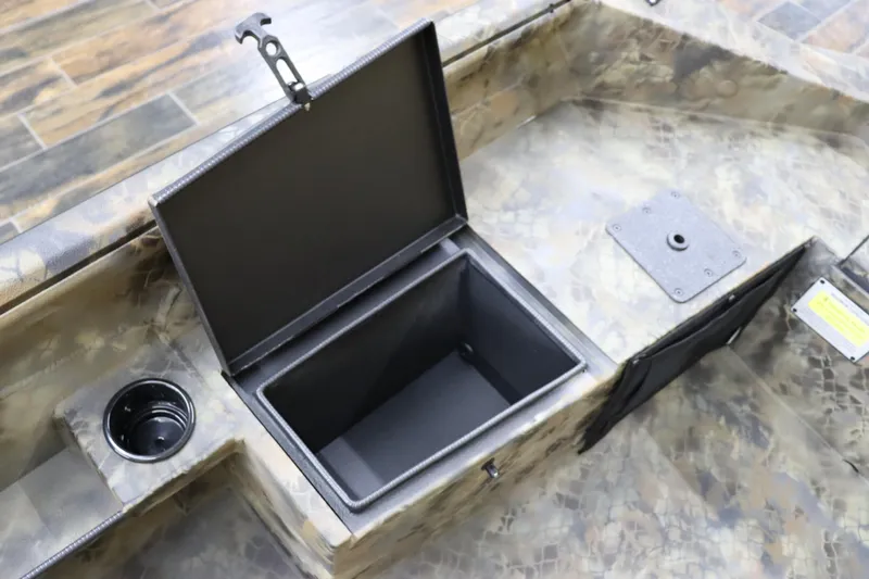 Slide: The Image of 2025 Excel 1751 Viper F4 boat storage compartment and cup holder. - 12